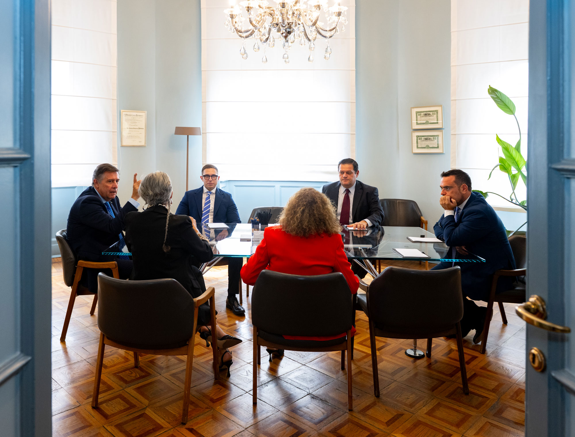 A PMP meeting in the boardroom at the Via Fontana office in Milan