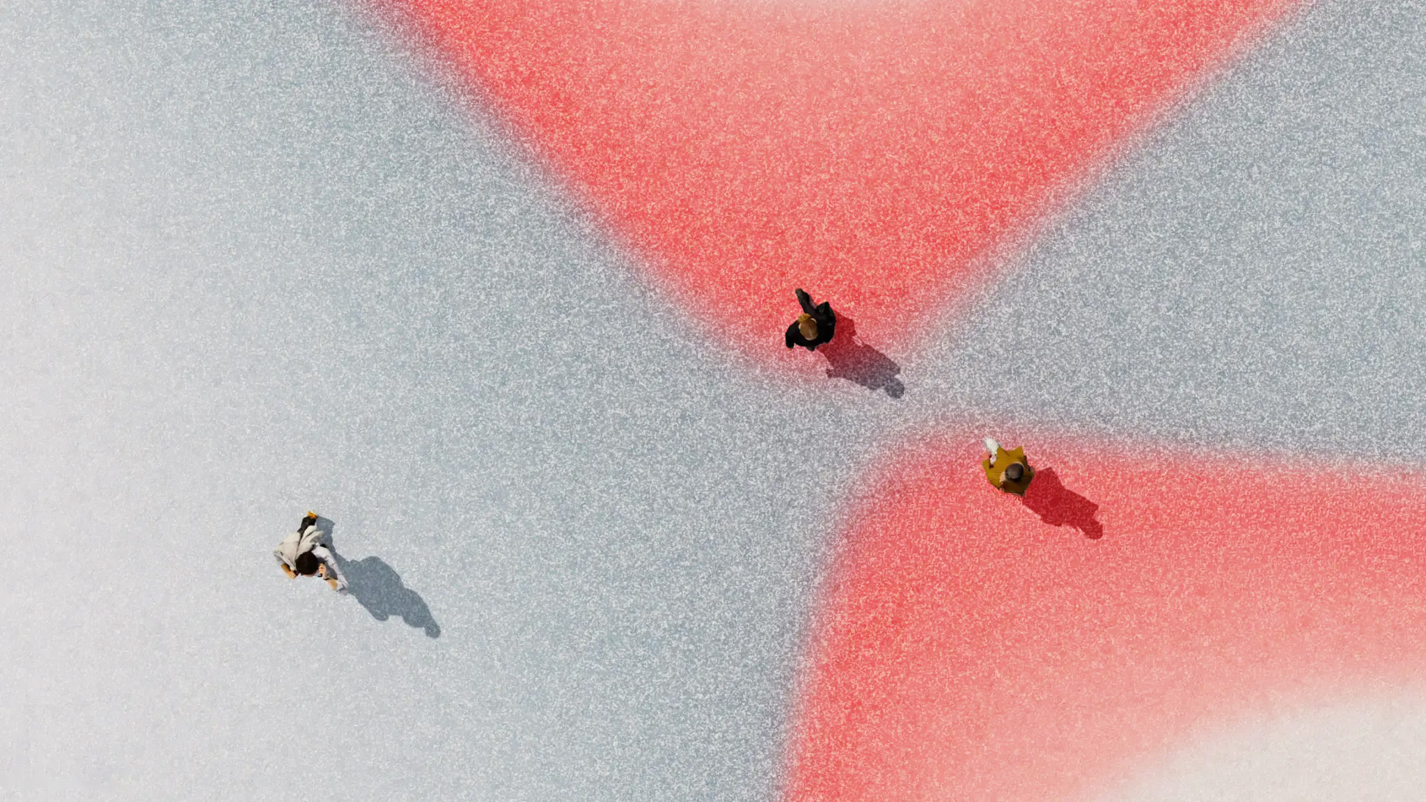 Aerial view of an urban pavement crossed by converging red bands