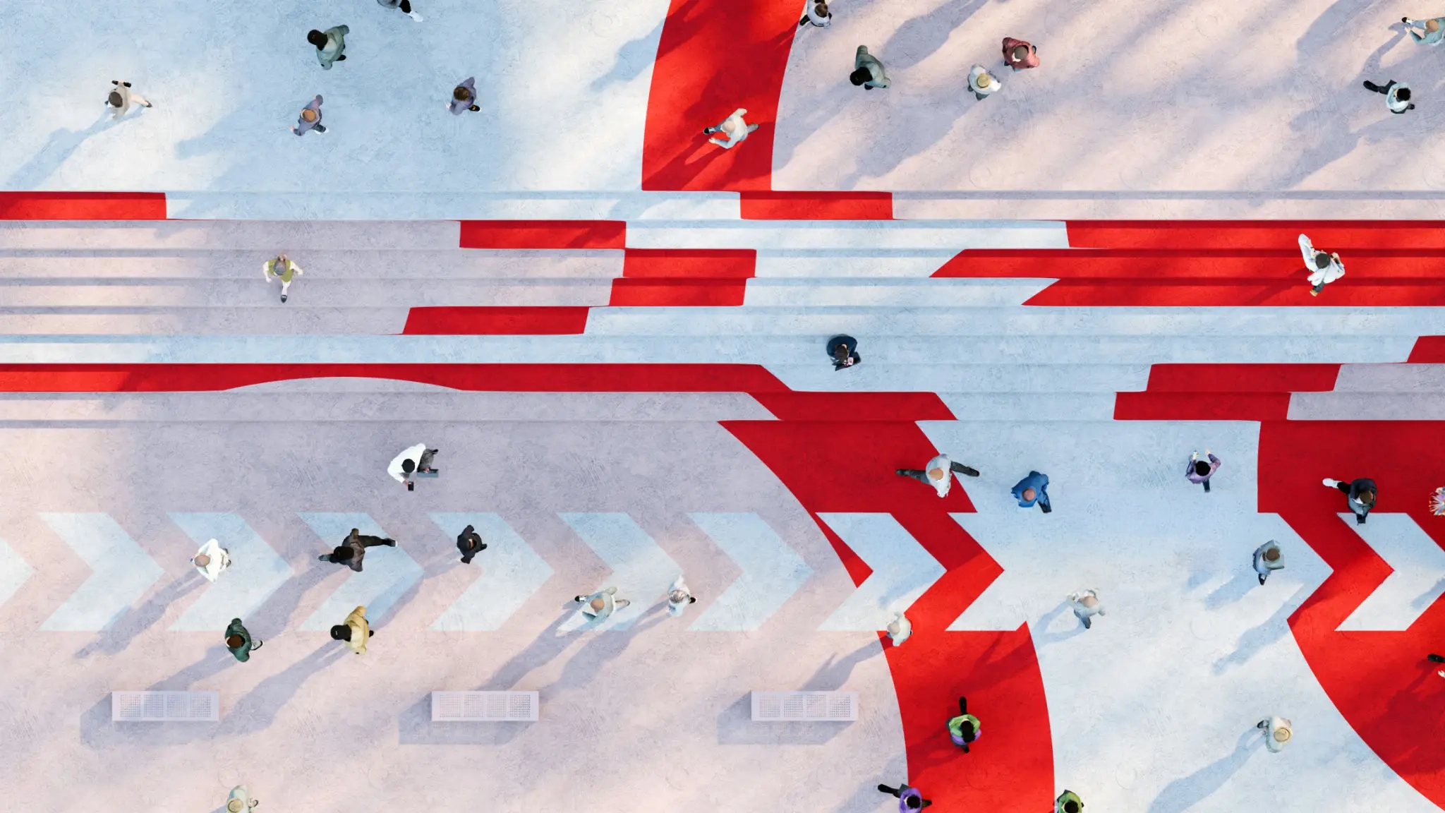 Aerial view of a square crossed by people and marked by red lines